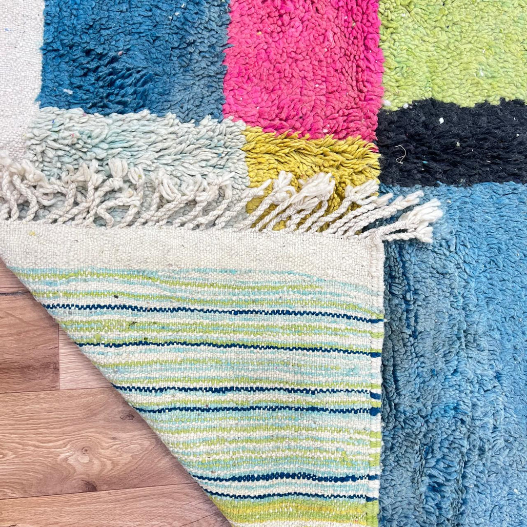 Vintage Moroccan wool rug 806 – handwoven color block Berber carpet in beige, green, yellow, magenta, and black, 229 × 154 cm (7.51 × 5.05 ft).