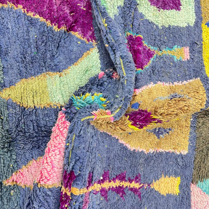 Vintage Moroccan wool rug 158 – handmade geometric colorful pattern in blue, purple, and mustard tones (264 × 147 cm).