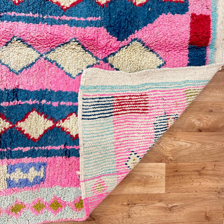 Vintage Moroccan Wool Rug 212 – handmade pink and blue diamond Moroccan wool rug (234 × 145 cm).
