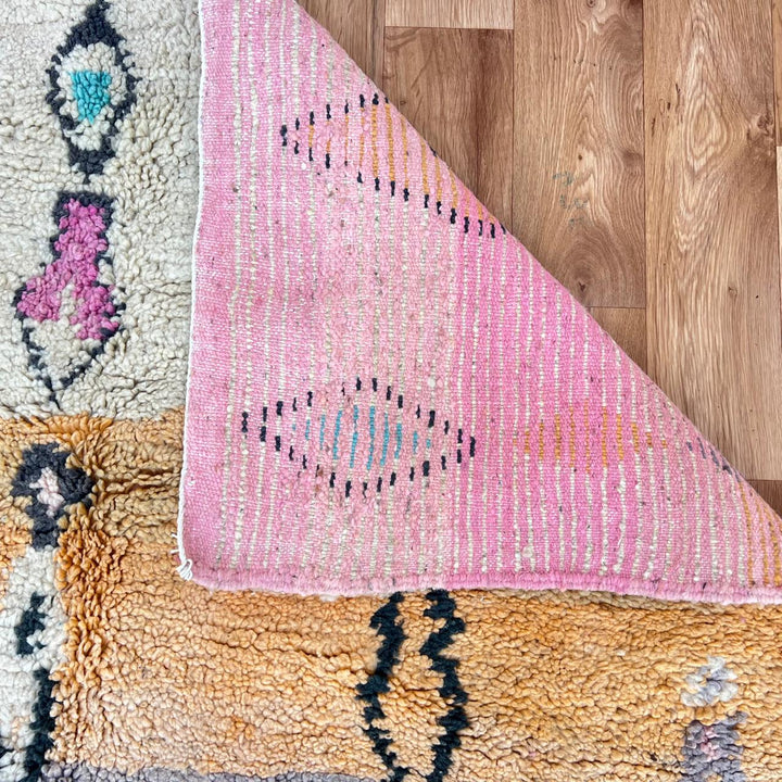 Vintage Moroccan wool rug 66 – handmade Berber carpet with pink, black, and aqua geometric patterns, 260 × 161 cm (8.53 × 5.28 ft).