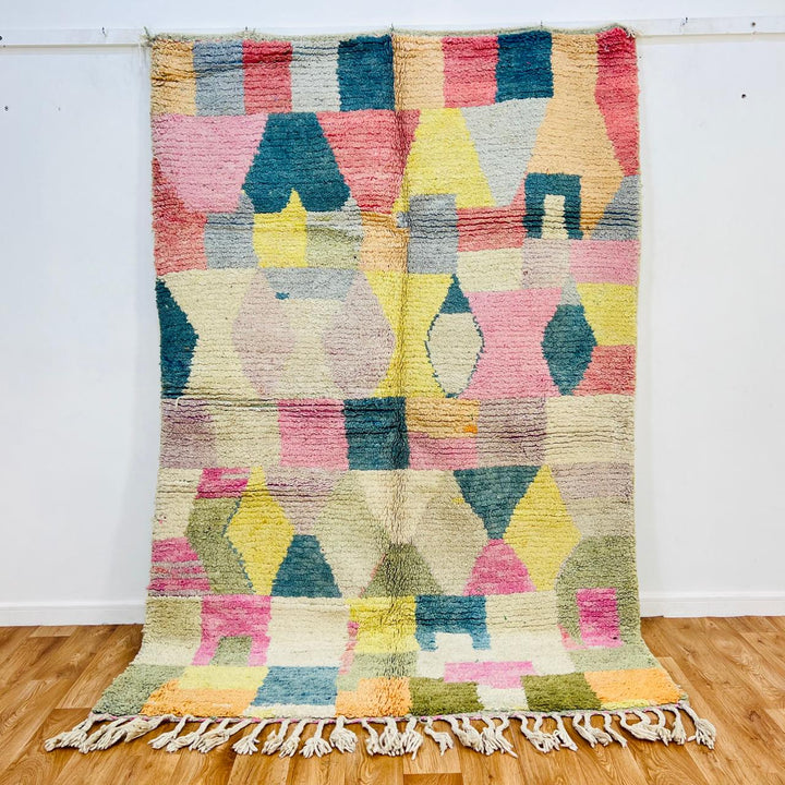 Vintage Moroccan wool rug 776 – handmade pastel geometric rug with pink, yellow, and blue tones, 240 × 162 cm (7.87 × 5.31 ft).