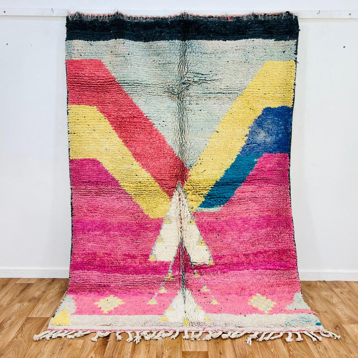 Vintage Moroccan wool rug 603 handmade Berber rug with chevron pattern in pink, yellow, and blue tones.