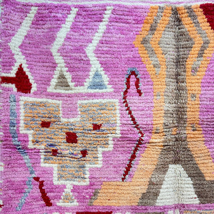 Vintage Moroccan wool rug 776 – colorful handmade Berber carpet with pink, red, and beige geometric patterns, 262 × 168 cm (8.59 × 5.51 ft).