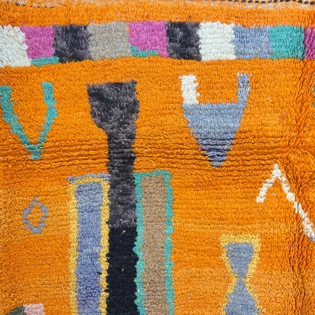 Vintage Moroccan wool rug 324 – handmade Berber carpet with bright orange base and multicolor geometric tribal design, 260 × 190 cm (8.53 × 6.23 ft).