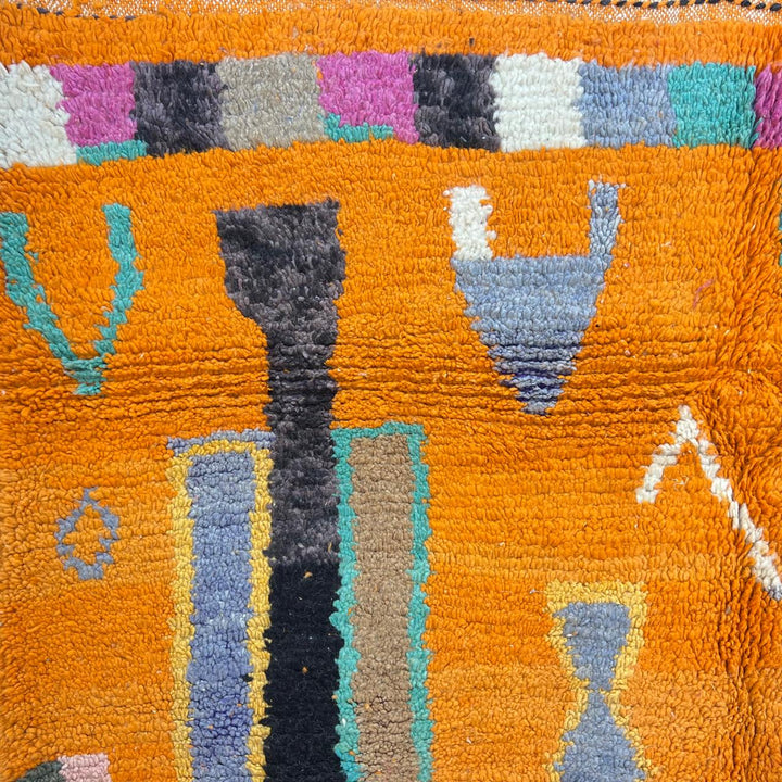 Vintage Moroccan wool rug 324 – handmade Berber carpet with bright orange base and multicolor geometric tribal design, 260 × 190 cm (8.53 × 6.23 ft).