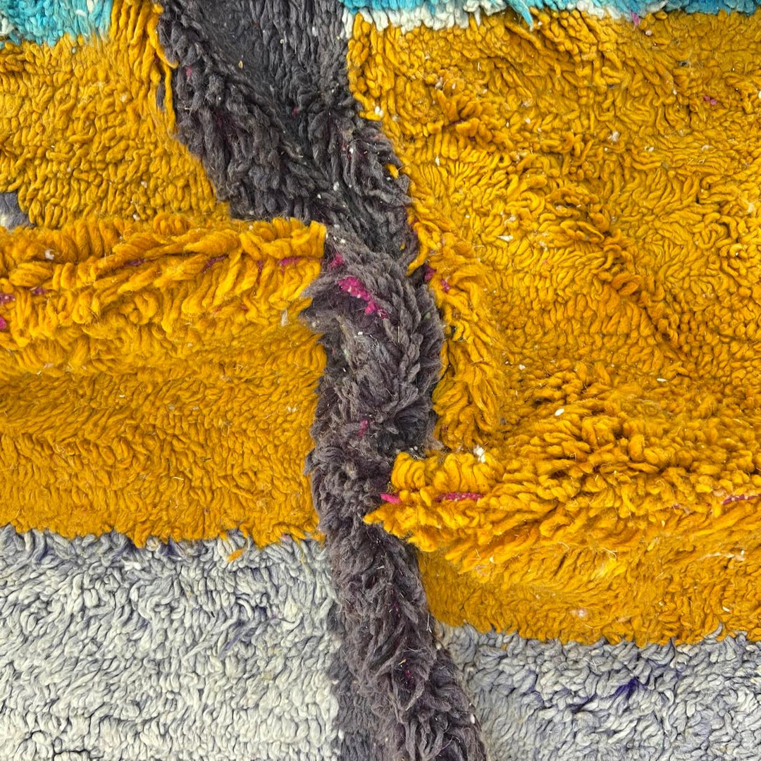 Vintage Moroccan wool rug 824 – handmade Berber carpet with yellow, blue, red, and gray abstract patterns, medium pile (299 × 200 cm / 9.81 × 6.56 ft).