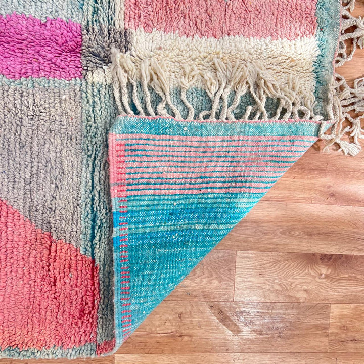 Vintage Moroccan Wool Rug 182 – handmade geometric pastel Moroccan rug in pink, teal, and beige tones (268 × 149 cm).