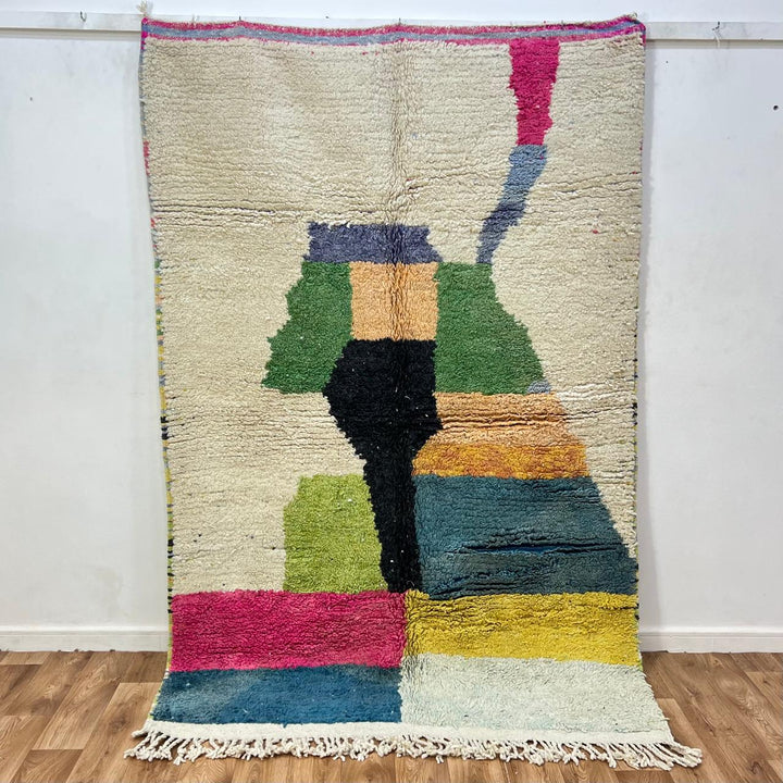 Vintage Moroccan wool rug 806 – handwoven color block Berber carpet in beige, green, yellow, magenta, and black, 229 × 154 cm (7.51 × 5.05 ft).