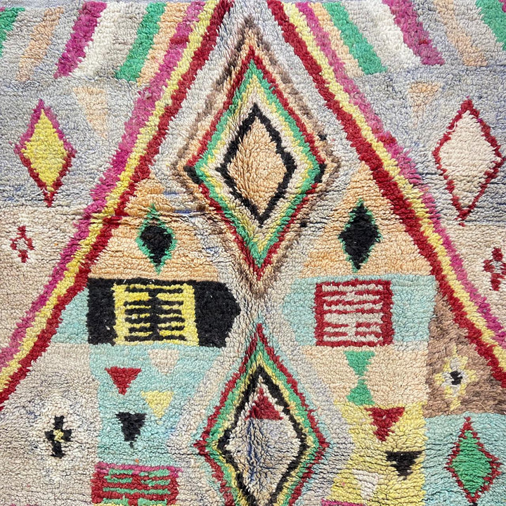 Vintage Moroccan wool rug 137 – handmade colorful geometric Berber design in turquoise, red, and yellow tones (256 × 156 cm).