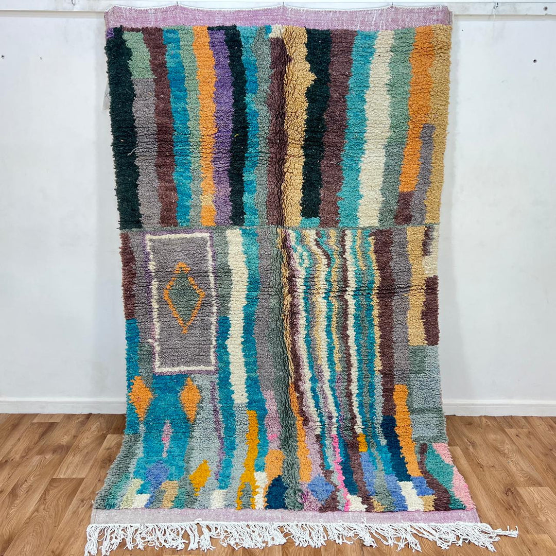 Vintage Moroccan wool rug 770 – handwoven Berber carpet with colorful vertical stripes in turquoise, yellow, gray, and cream (253 × 153 cm / 8.3 × 5.02 ft).