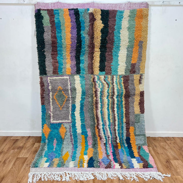 Vintage Moroccan wool rug 770 – handwoven Berber carpet with colorful vertical stripes in turquoise, yellow, gray, and cream (253 × 153 cm / 8.3 × 5.02 ft).