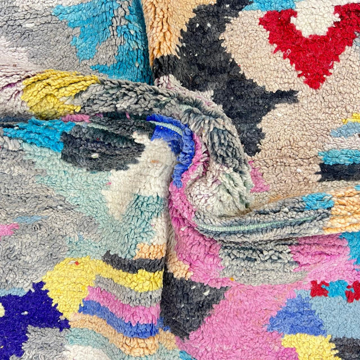 Vintage Moroccan wool rug 732 – handwoven Berber carpet with colorful abstract geometric motifs in red, blue, yellow, and beige, 240 × 152 cm (7.87 × 4.98 ft).
