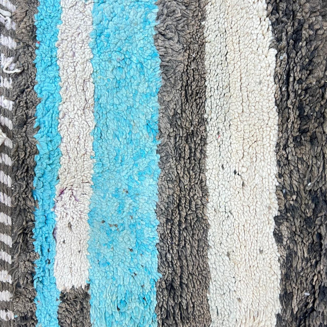 Vintage Moroccan wool rug 787 – handwoven Berber carpet in natural brown, beige, and green tones with soft geometric stripes, 244 × 163 cm (8.00 × 5.34 ft).
