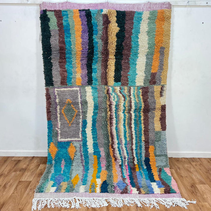 Vintage Moroccan wool rug 770 – handwoven Berber carpet with colorful vertical stripes in turquoise, yellow, gray, and cream (253 × 153 cm / 8.3 × 5.02 ft).