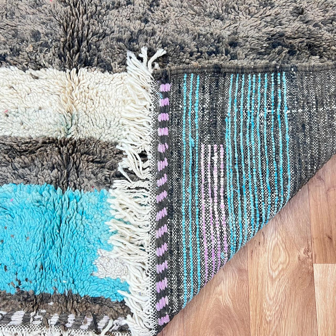 Vintage Moroccan wool rug 787 – handwoven Berber carpet in natural brown, beige, and green tones with soft geometric stripes, 244 × 163 cm (8.00 × 5.34 ft).