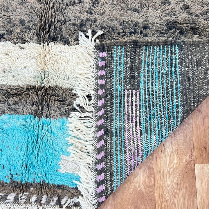Vintage Moroccan wool rug 787 – handwoven Berber carpet in natural brown, beige, and green tones with soft geometric stripes, 244 × 163 cm (8.00 × 5.34 ft).