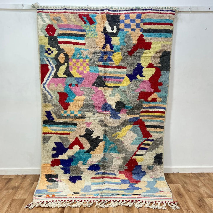 Vintage Moroccan wool rug 732 – handwoven Berber carpet with colorful abstract geometric motifs in red, blue, yellow, and beige, 240 × 152 cm (7.87 × 4.98 ft).