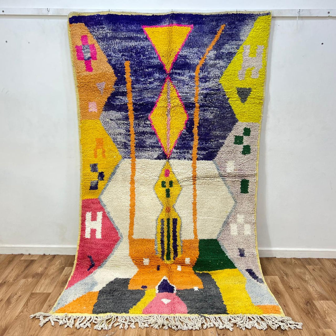 Vintage Moroccan wool rug 143 – handmade yellow, purple, and cream geometric Berber design (250 × 150 cm).