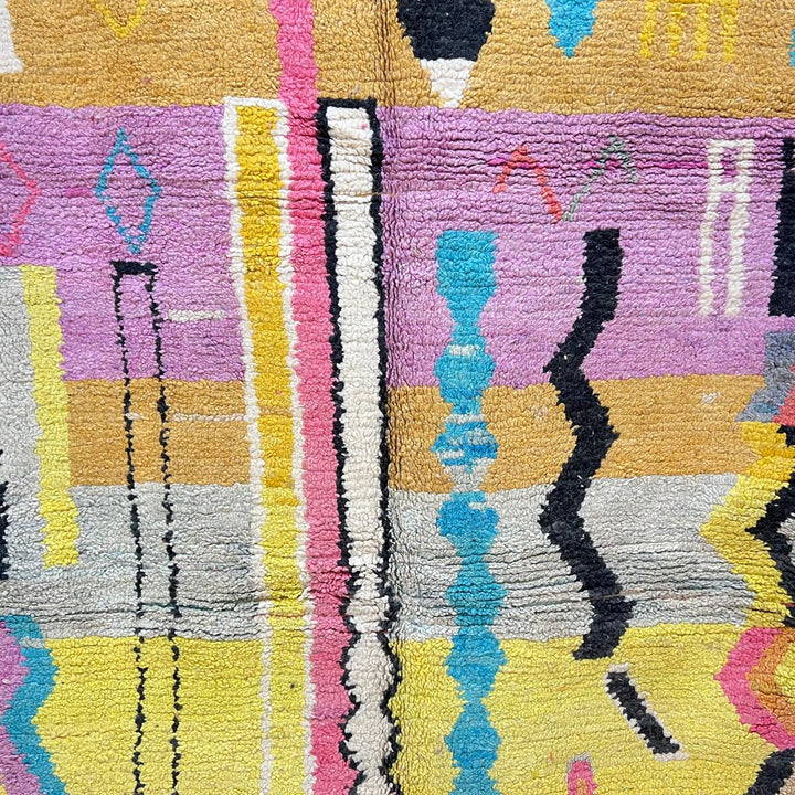 Vintage Moroccan wool rug 729 – handmade pink, yellow, and blue Berber carpet with abstract geometric tribal motifs, 268 × 164 cm (8.79 × 5.38 ft).