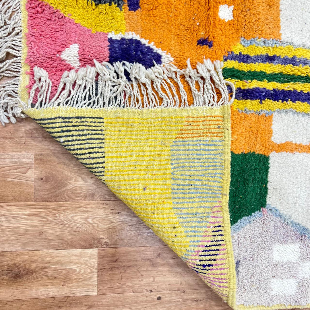 Vintage Moroccan wool rug 143 – handmade yellow, purple, and cream geometric Berber design (250 × 150 cm).