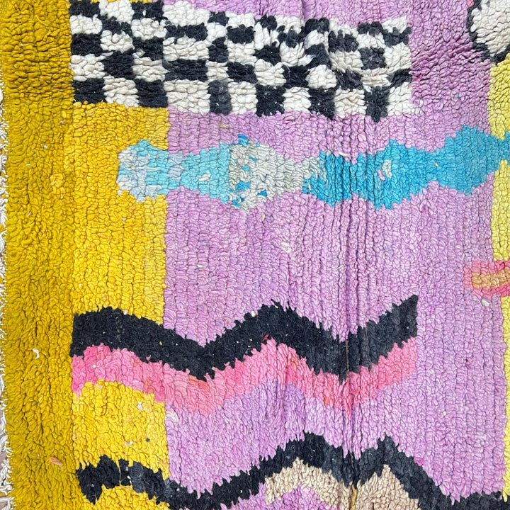 Vintage Moroccan wool rug 729 – handmade pink, yellow, and blue Berber carpet with abstract geometric tribal motifs, 268 × 164 cm (8.79 × 5.38 ft).
