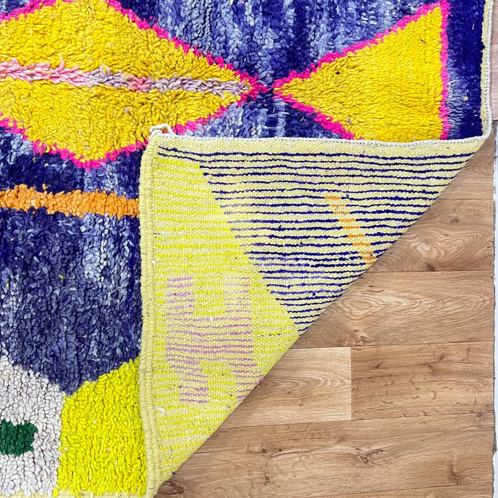 Vintage Moroccan wool rug 143 – handmade yellow, purple, and cream geometric Berber design (250 × 150 cm).