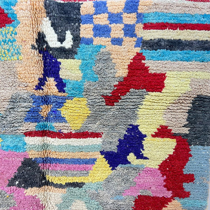 Vintage Moroccan wool rug 732 – handwoven Berber carpet with colorful abstract geometric motifs in red, blue, yellow, and beige, 240 × 152 cm (7.87 × 4.98 ft).