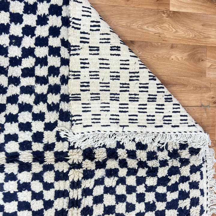 Vintage Moroccan wool rug 146 – handmade black and white checkered geometric Berber design (248 × 146 cm).