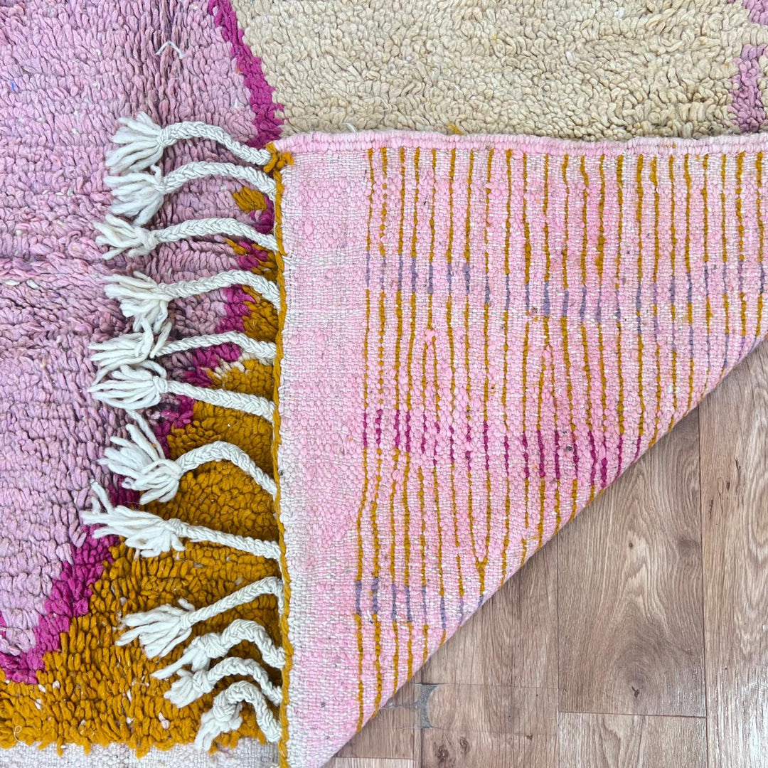 Vintage Moroccan wool rug 745 – handmade orange and pink Berber carpet with geometric diamond pattern (251 × 173 cm / 8.23 × 5.67 ft).