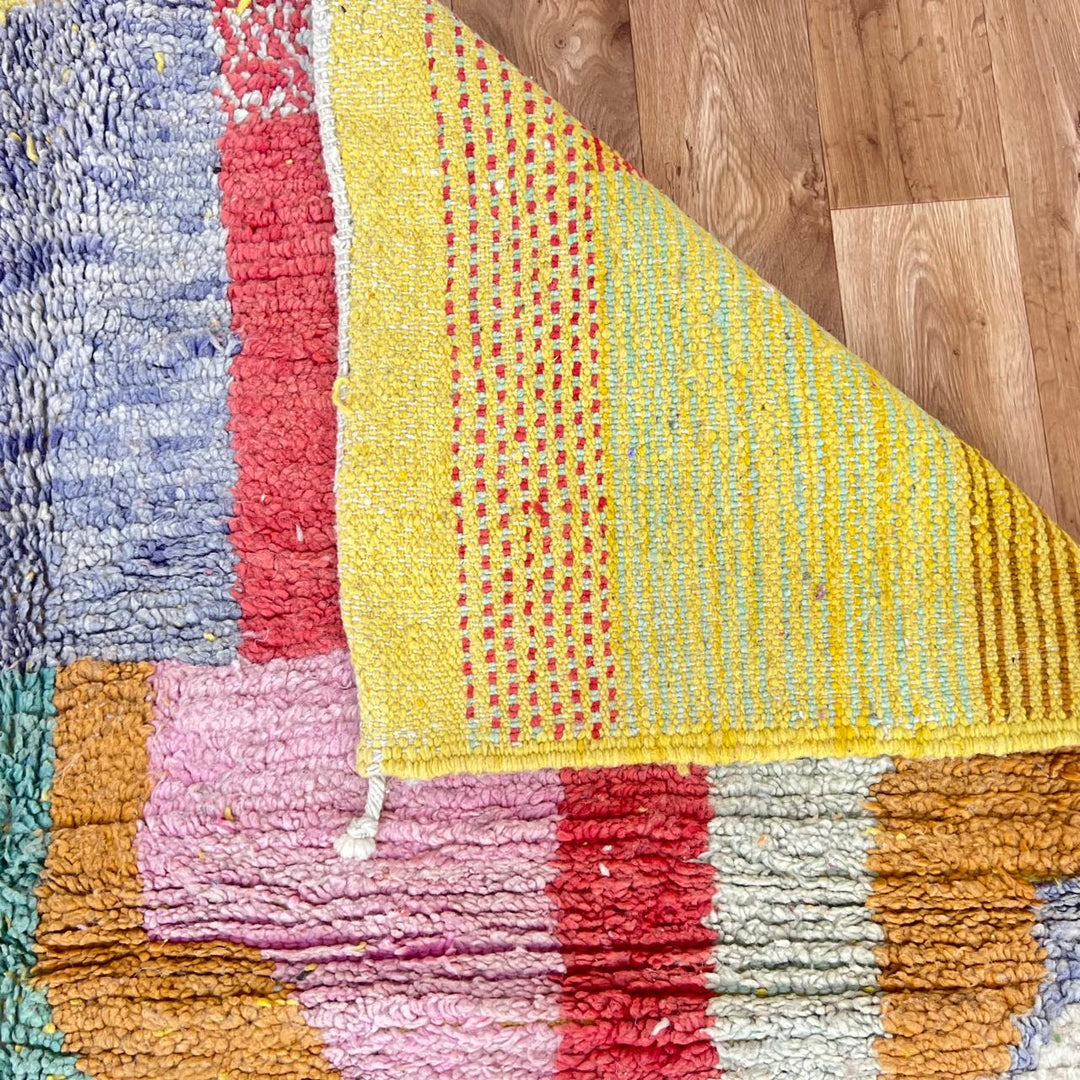 Vintage Moroccan wool rug 831 – handmade Berber carpet with colorful geometric abstract patterns, 305 × 187 cm (10.00 × 6.13 ft).