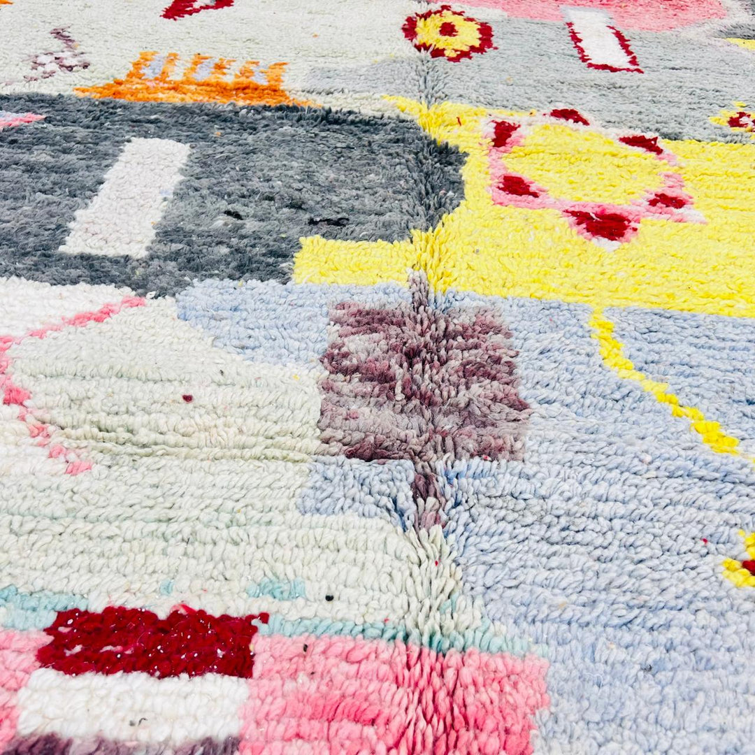Vintage Moroccan wool rug with colorful abstract Berber geometric patterns in grey, pink, yellow and ivory, handmade in Morocco, 257x158 cm