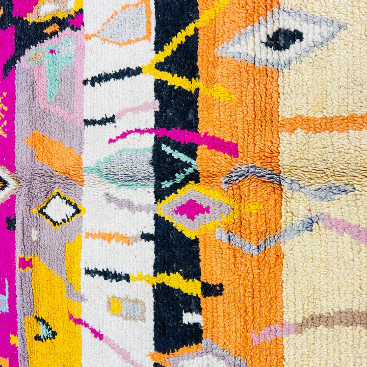 Vintage Moroccan wool rug with colorful Berber geometric symbols, handmade in Morocco
