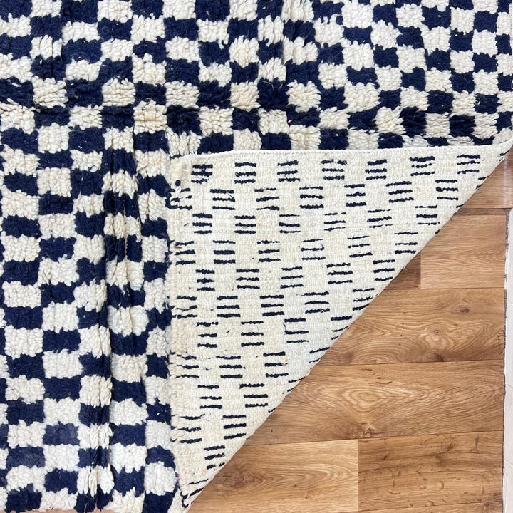 Vintage Moroccan wool rug 146 – handmade black and white checkered geometric Berber design (248 × 146 cm).