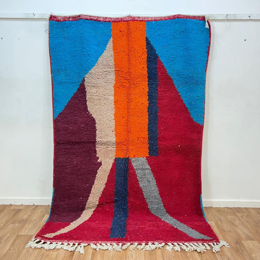 Vintage Moroccan wool rug 201 – handmade red, blue, and orange abstract geometric design (243 × 159 cm).