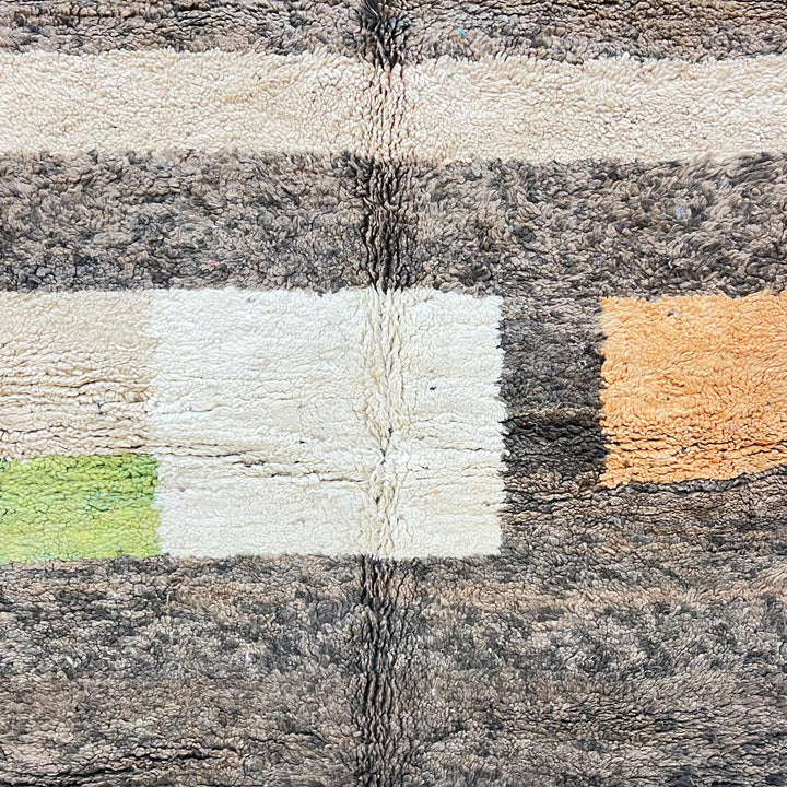 Vintage Moroccan wool rug 787 – handwoven Berber carpet in natural brown, beige, and green tones with soft geometric stripes, 244 × 163 cm (8.00 × 5.34 ft).