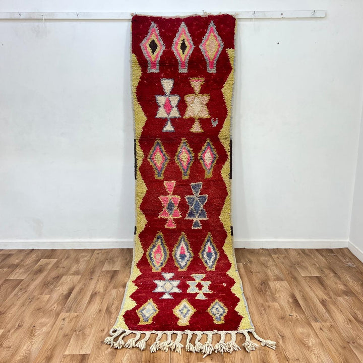 Vintage Moroccan wool rug 820 – red Berber runner with yellow borders and geometric diamond motifs (290 × 84 cm / 9.51 × 2.75 ft).
