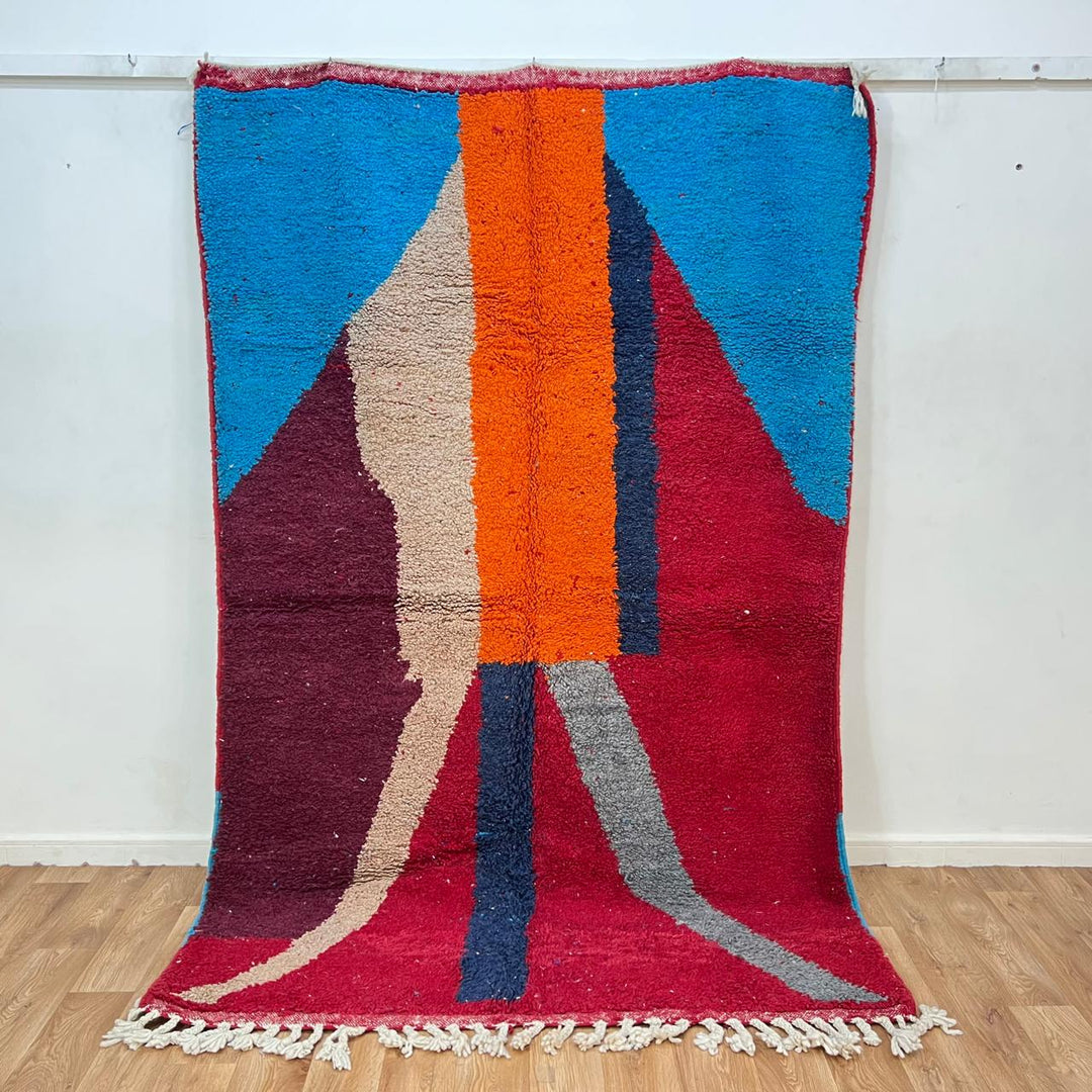 Vintage Moroccan wool rug 201 – handmade red, blue, and orange abstract geometric design (243 × 159 cm).