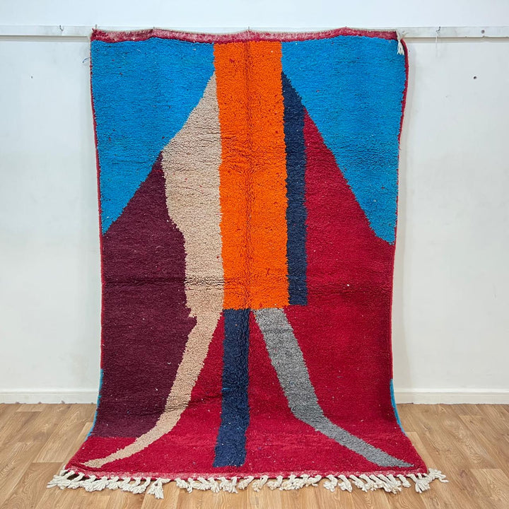 Vintage Moroccan wool rug 201 – handmade red, blue, and orange abstract geometric design (243 × 159 cm).