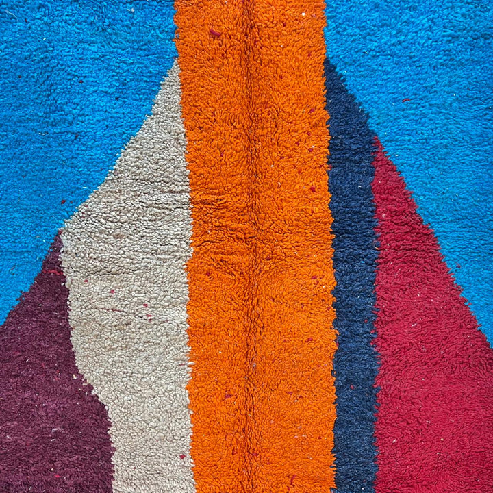 Vintage Moroccan wool rug 201 – handmade red, blue, and orange abstract geometric design (243 × 159 cm).
