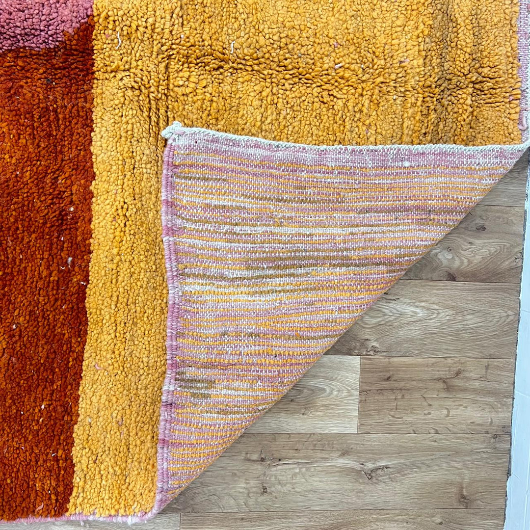 Vintage Moroccan wool rug 149 – handmade abstract design in orange, pink, and terracotta tones (283 × 155 cm).