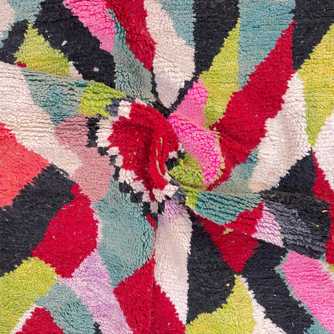 Vintage Moroccan wool rug 210 – handmade colorful geometric Berber design in red, green, pink, and cream (282 × 158 cm).