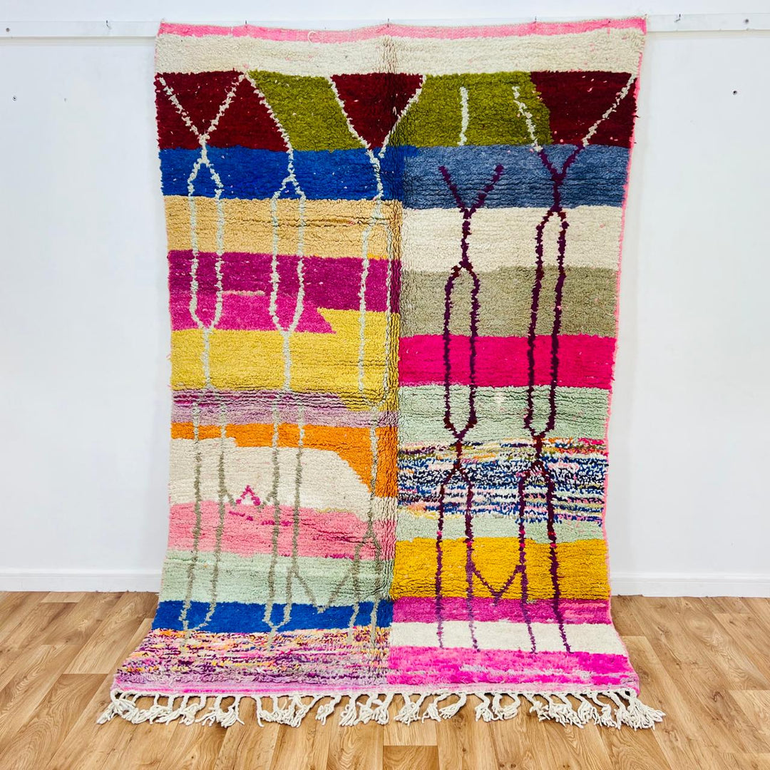 Vintage Moroccan Berber wool rug with colorful geometric patchwork pattern