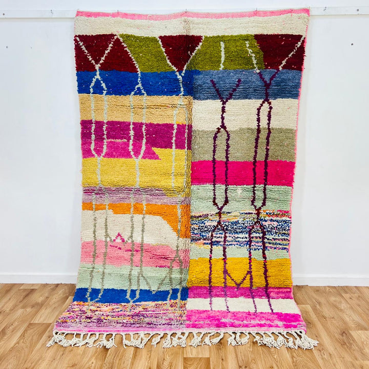Vintage Moroccan Berber wool rug with colorful geometric patchwork pattern