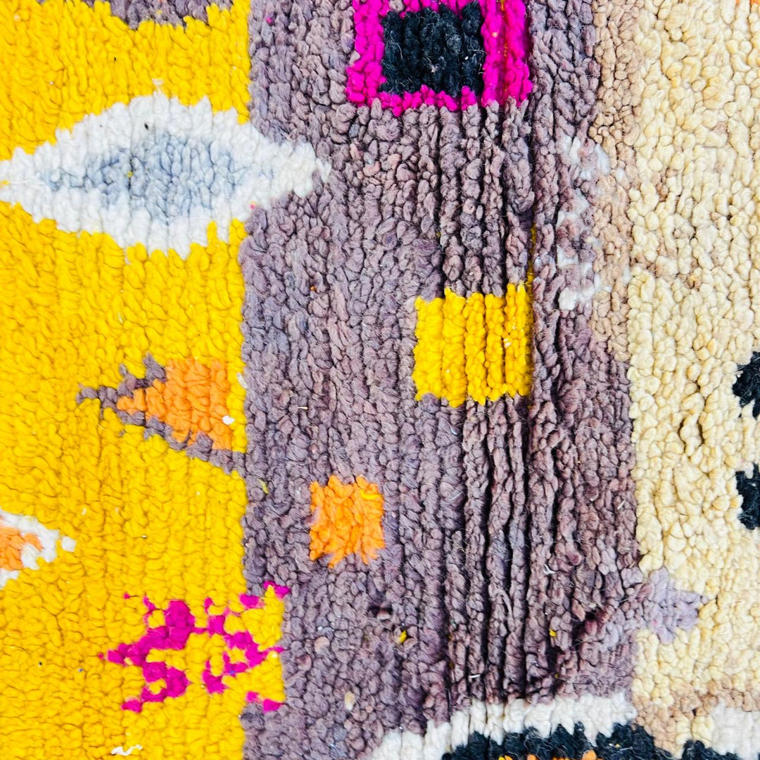 Vintage Moroccan wool rug with colorful Berber geometric symbols, handmade in Morocco