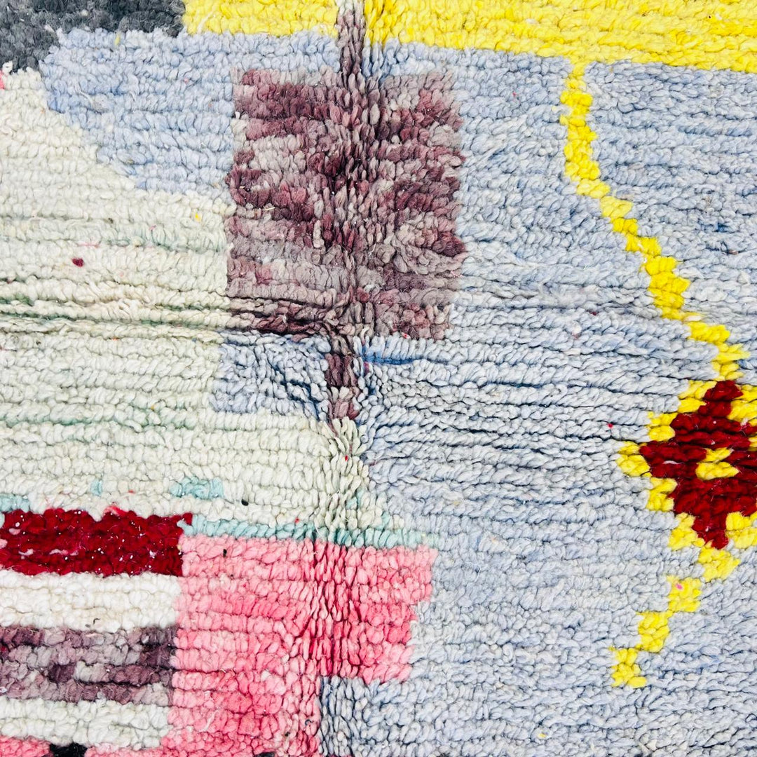 Vintage Moroccan wool rug with colorful abstract Berber geometric patterns in grey, pink, yellow and ivory, handmade in Morocco, 257x158 cm