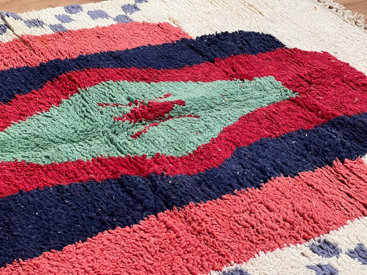 Vintage Moroccan wool rug with bold geometric Berber design in red, navy and mint