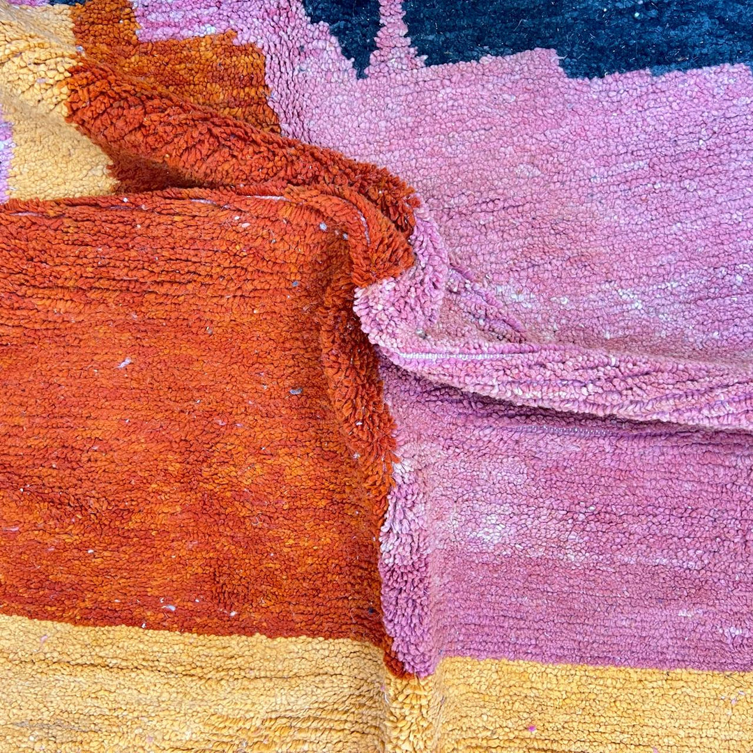 Vintage Moroccan wool rug 149 – handmade abstract design in orange, pink, and terracotta tones (283 × 155 cm).