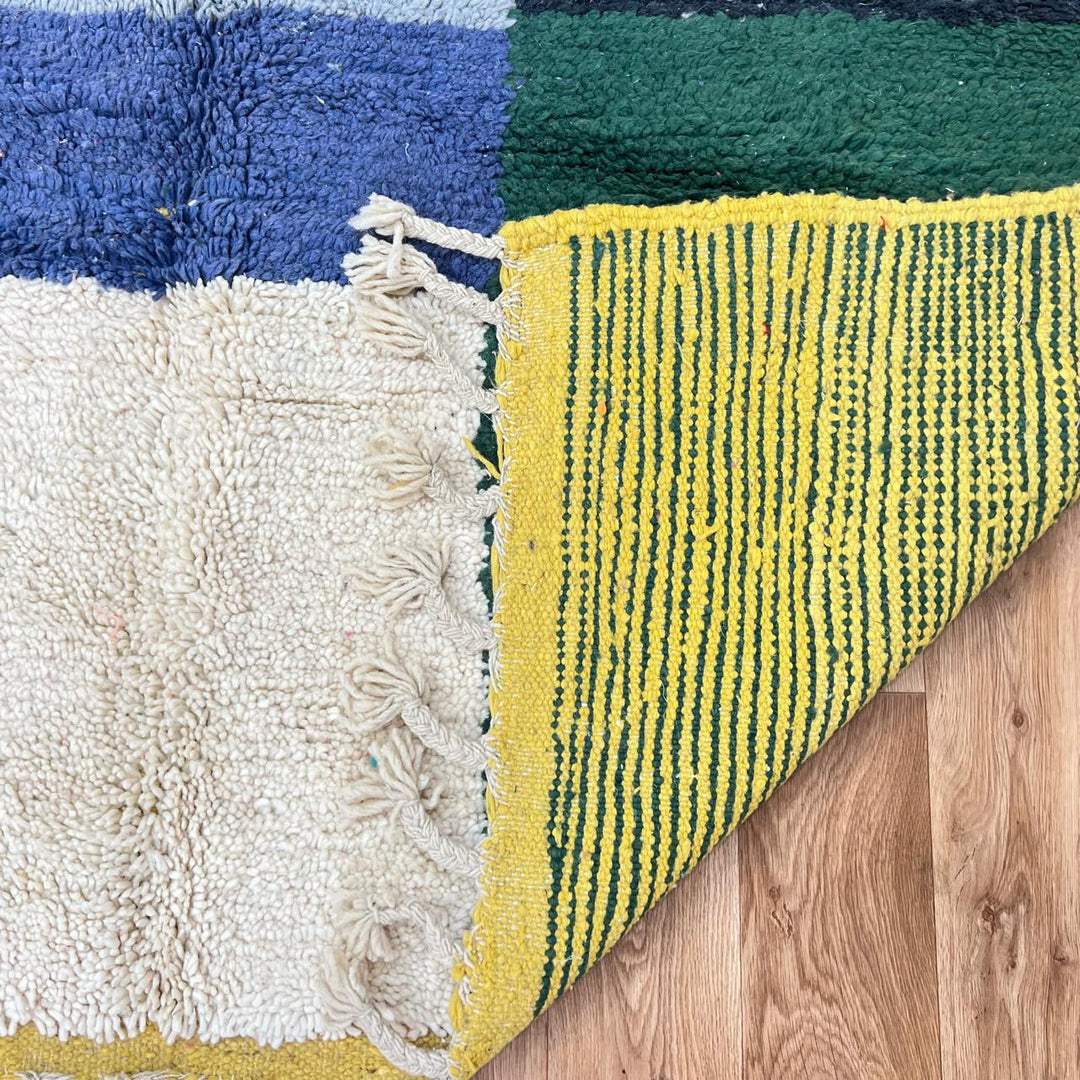 Vintage Moroccan wool rug 869 – handmade Berber carpet with color blocks in pink, green, blue, and orange. 232 × 190 cm (7.61 × 6.23 ft).