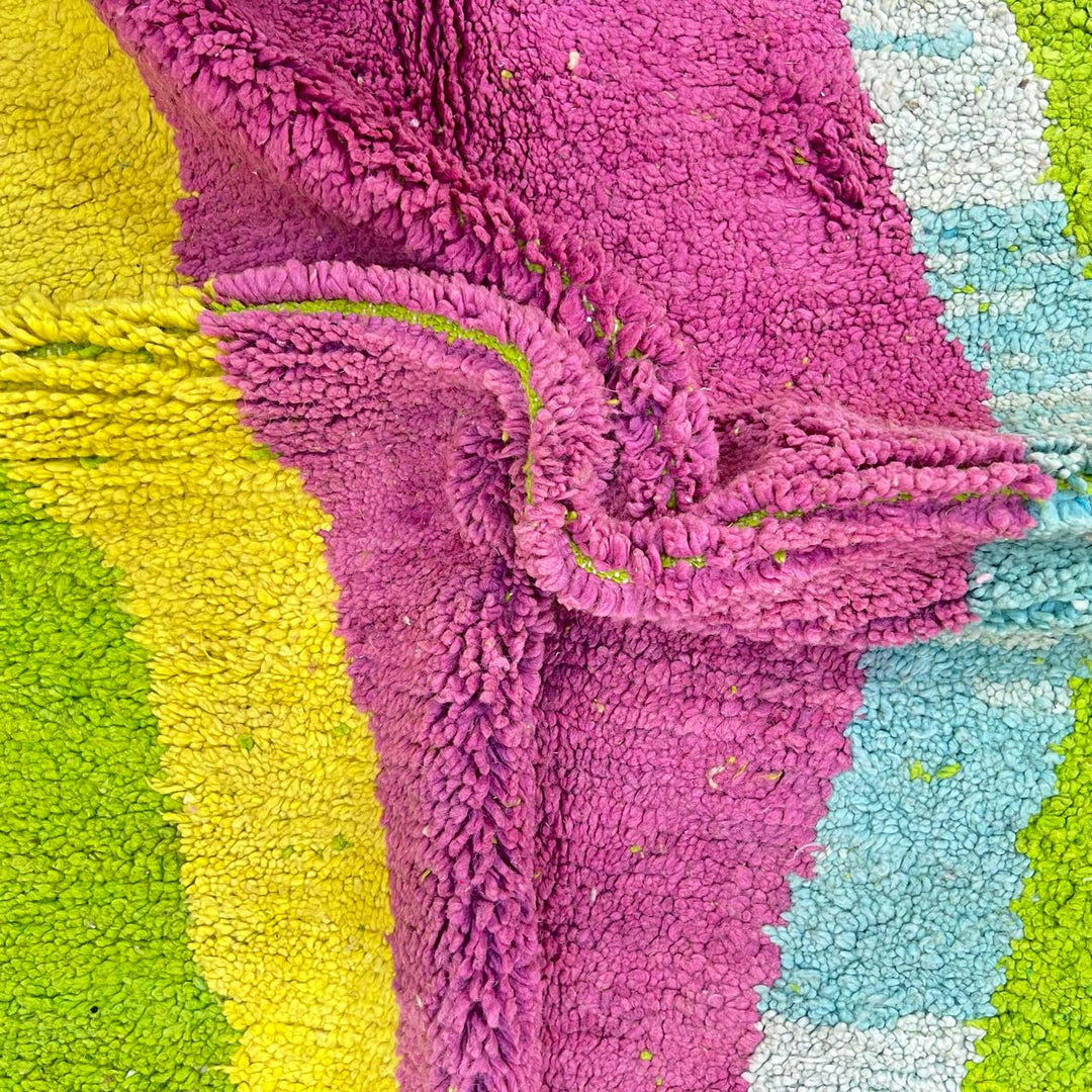 Vintage Moroccan wool rug 877 – handmade Berber carpet with lime green base and pink-yellow abstract stripe, 299 × 206 cm (9.81 × 6.75 ft).