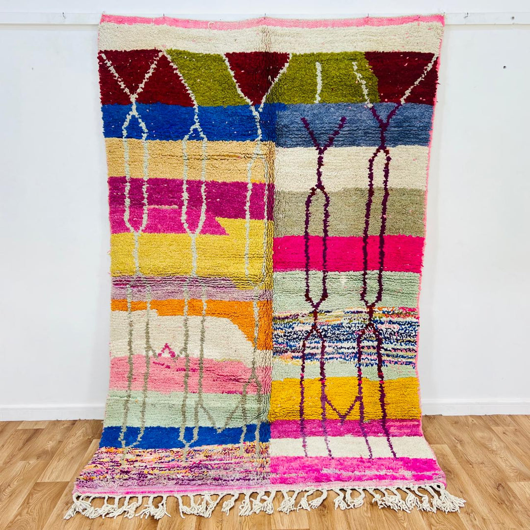 Vintage Moroccan Berber wool rug with colorful geometric patchwork pattern